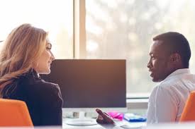 A couple of translators discussing work issued