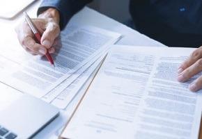 a picture of the signing of a contract